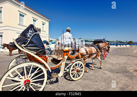 A horse drawn carriage in the city of Spetses island, Greece Stock Photo