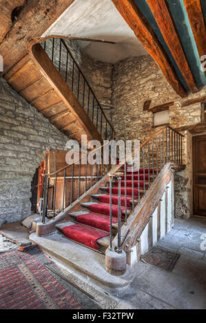 Imposing staircase in an abandoned castle Stock Photo