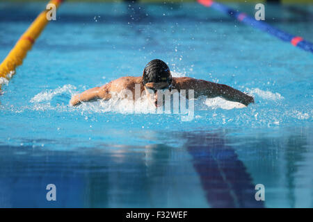 ISTANBUL, TURKEY - AUGUST 15, 2015: Unidentified competitor swims at the Turkcell Turkish Swimming Championship in Enka Sports C Stock Photo