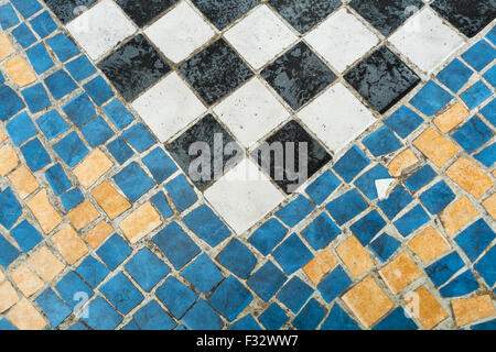 Surface with irregular, rustic mosaic tiles in a full frame take Stock Photo
