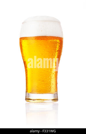 Glass of fresh beer with cap of foam isolated on white background. Stock Photo