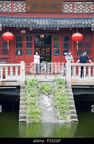 Huxinting tea house at the entrance to Yuyuan Garden in Shanghai's old city, China Stock Photo