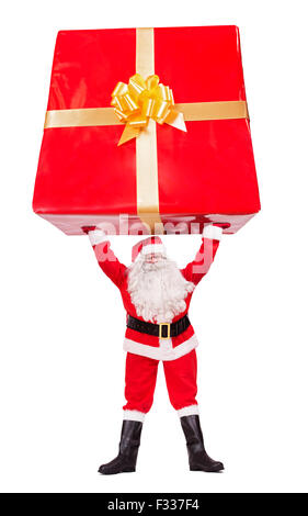 Santa Claus carries Christmas gift isolated on white background Stock Photo