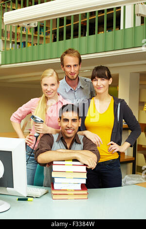 Librarian man, woman and reception for books, learning and knowledge ...