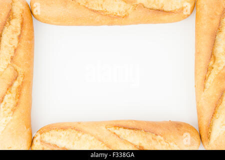 Bread frame, pieces of baguettes isolated on white. Stock Photo