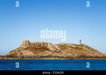 The fort and lighthouse in Moines Island, Ile aux Moines, Sept-Iles archipelago Cotes d'Armor, Brittany, France. Stock Photo