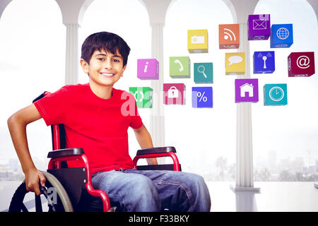 Composite image of portrait of boy sitting in wheelchair Stock Photo