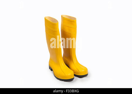 Yellow rubber boots isolated Stock Photo