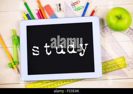 Study against students table with school supplies Stock Photo