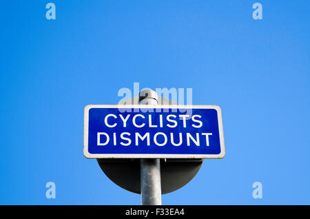 Cyclists Dismount Sign Do not ride on Footpath Stock Photo