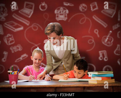 Composite image of teacher helping pupils in library Stock Photo