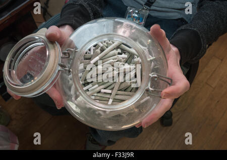 Individual marijuana joint is most popular item in marijuana dispensary.  Denver, CO Stock Photo