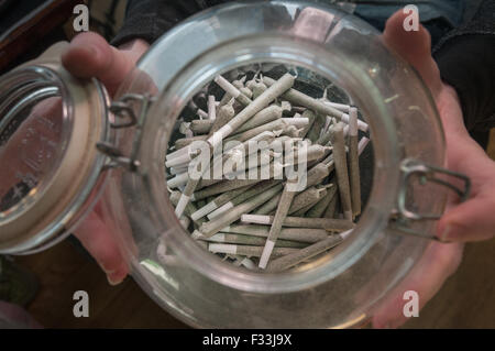 Individual marijuana joint is most popular item in marijuana dispensary.  Denver, CO Stock Photo