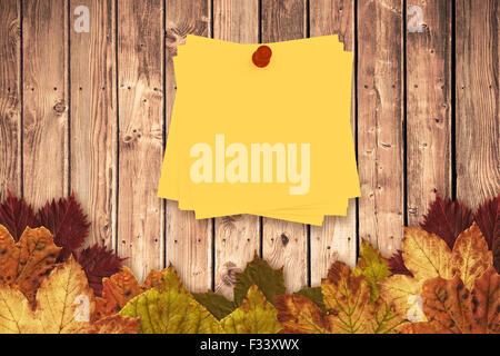 Composite image of sticky note with red pushpin Stock Photo