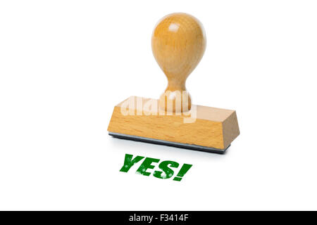 Yes printed in red ink with wooden Rubber stamp isolated on white background Stock Photo