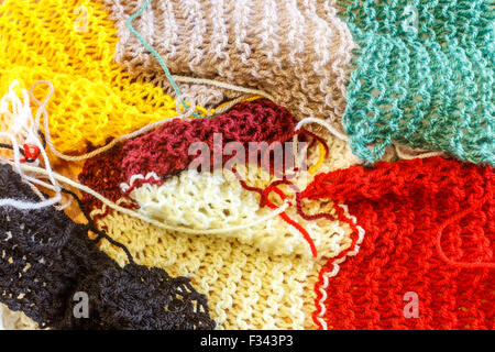 colorful scarf of wool on a wooden background Stock Photo