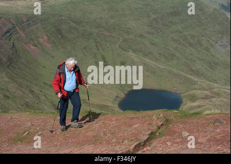 Brecon Beacons, UK. 29th September, 2015. Walkers enjoyed the early morning autumn sun, as they climbed up to admire clear panoramic views. Pen Y Fan is the highest mountain in south Wales and indeed the southern part of the United Kingdom. Credit:  roger tiley/Alamy Live News Stock Photo