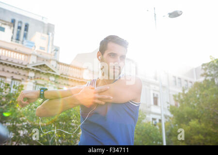 Handsome athlete warming up Stock Photo