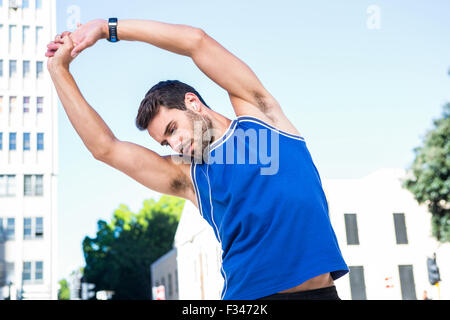 Handsome athlete warming up Stock Photo