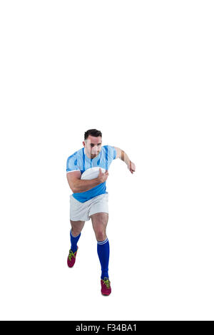 Rugby player running with the ball Stock Photo
