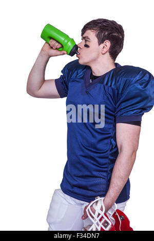 American football player drinking water Stock Photo