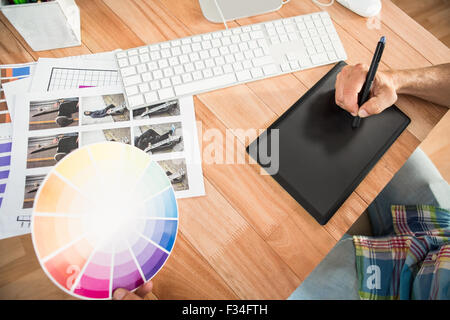 Casual designer working with digitizer Stock Photo