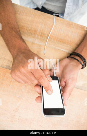 Hands touching smartphone Stock Photo