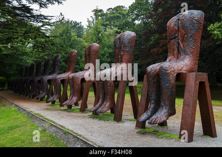 Ten Seated Figures by Magdalena Abakanowicz. Stock Photo