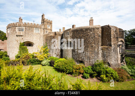 Walmer Tudor castle, built in the shape of a rose. The main keep, much altred since it was built in 1540, with the dry moat. Blue and white cloudy sky. Stock Photo