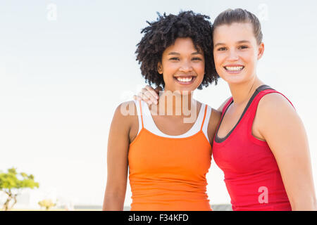 Two young women smiling at camera Stock Photo
