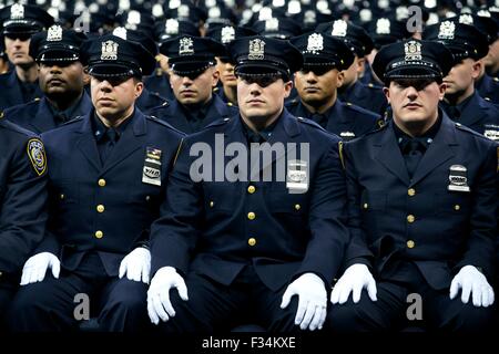 New York City Mayor Bill de Blasio delivers remarks at NY Police Department graduation ceremony in Madison Square Garden December 29, 2014 in New York City. Stock Photo