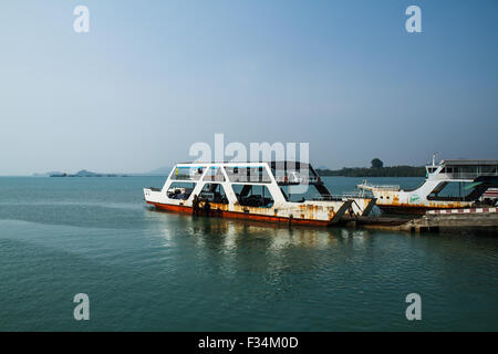 The Koh Chang ferry pier and ferry going to Koh Chang island  in Trat, Thailand Stock Photo