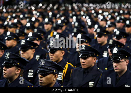 New York City Mayor Bill de Blasio delivers remarks at NY Police Department graduation ceremony in Madison Square Garden December 29, 2014 in New York City. Stock Photo