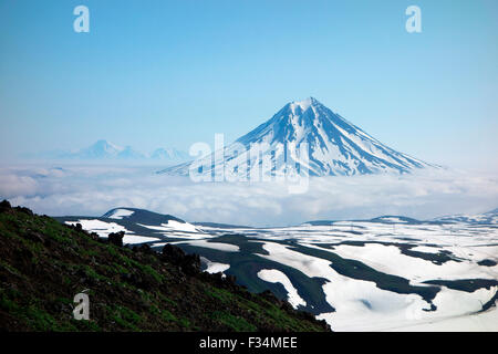 Beautiful view of Vilyuchinsky volcano and Koryaksky and Avacha volcanoes at the background, Kamchatka Peninsula, Russia Stock Photo