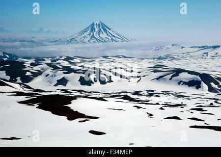Beautiful view of Vilyuchinsky volcano and Koryaksky and Avacha volcanoes at the background, Kamchatka Peninsula, Russia Stock Photo
