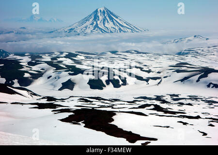 Beautiful view of Vilyuchinsky volcano and Koryaksky and Avacha volcanoes at the background, Kamchatka Peninsula, Russia Stock Photo