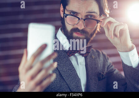 Portrait of fashionable man taking picture of himself Stock Photo