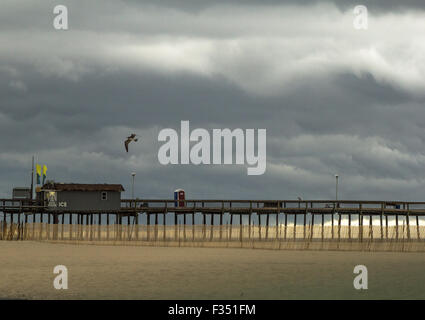 Ocean City Inlet Fishing Pier, at the edge of a storm Stock Photo