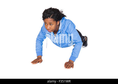 Fit woman doing push up Stock Photo
