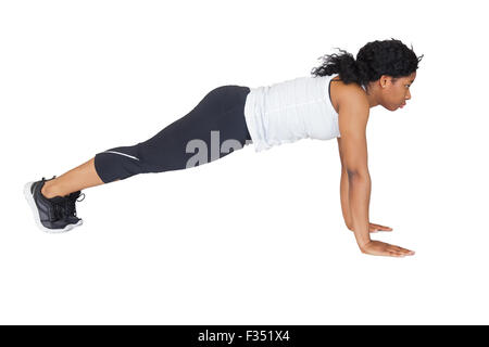 Fit woman doing push up Stock Photo