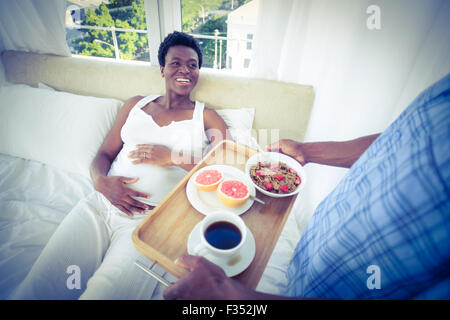 High angle view of pregnant woman smiling Stock Photo