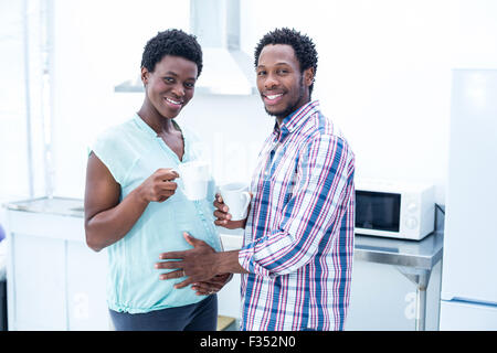 Portrait of happy couple having coffee Stock Photo
