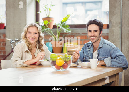 Portrait of happy creative business people during coffee break Stock Photo