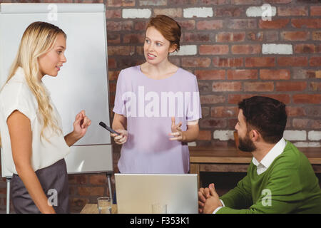 Business people having discussion during presentation Stock Photo