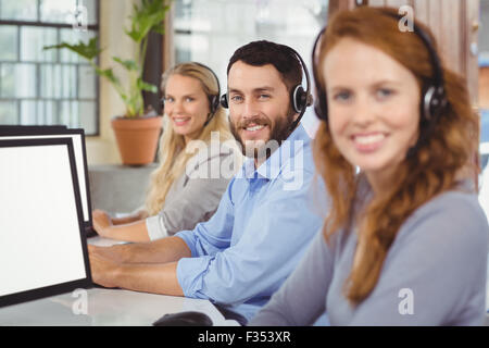 Portrait of smiling operators Stock Photo - Alamy