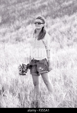Beautiful woman portrait enjoying a day outdoors. Stock Photo