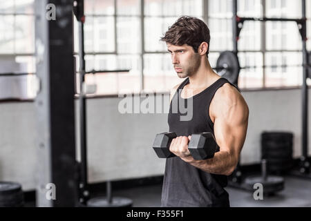 Young Bodybuilder doing weightlifting Stock Photo