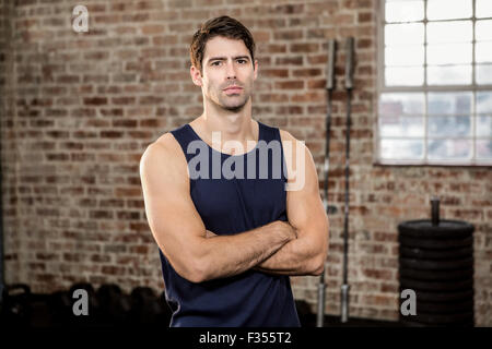 Serious man with arms crossed Stock Photo