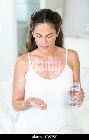 Pregnant woman with antibiotics Stock Photo