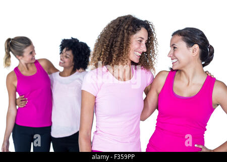 Happy women with arms around Stock Photo